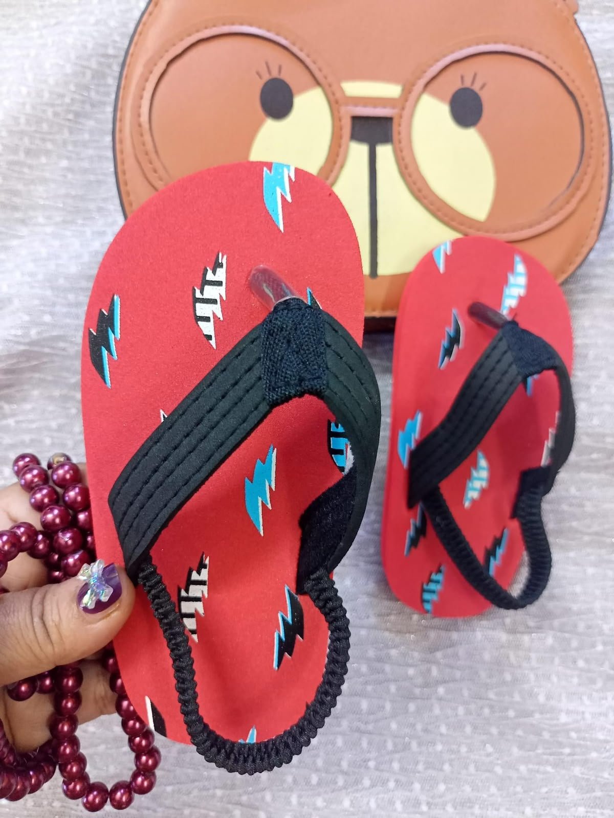 Kids’ printed EVA flip-flops in Red